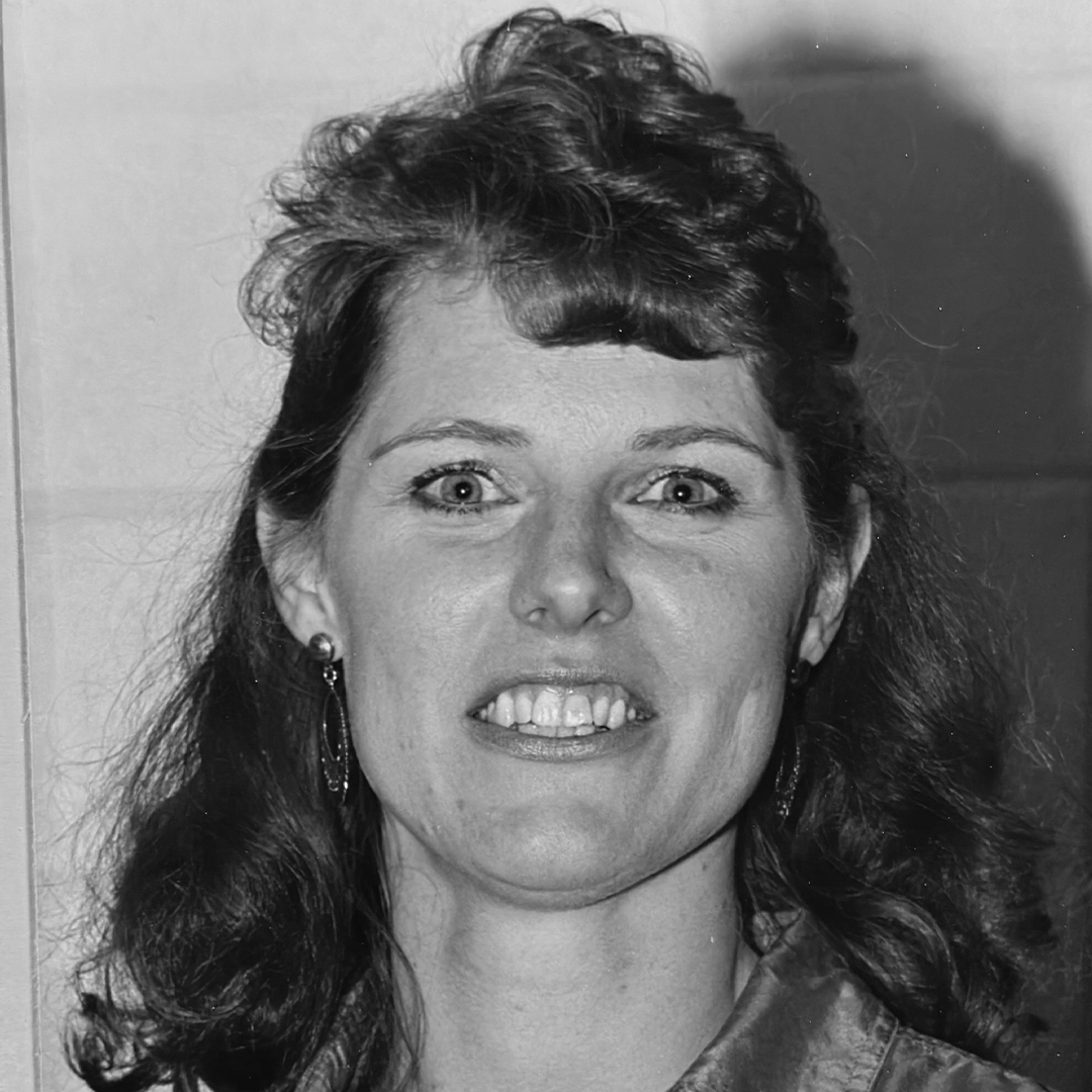 A black and white photo of Deb (Vries) Dezwart. 