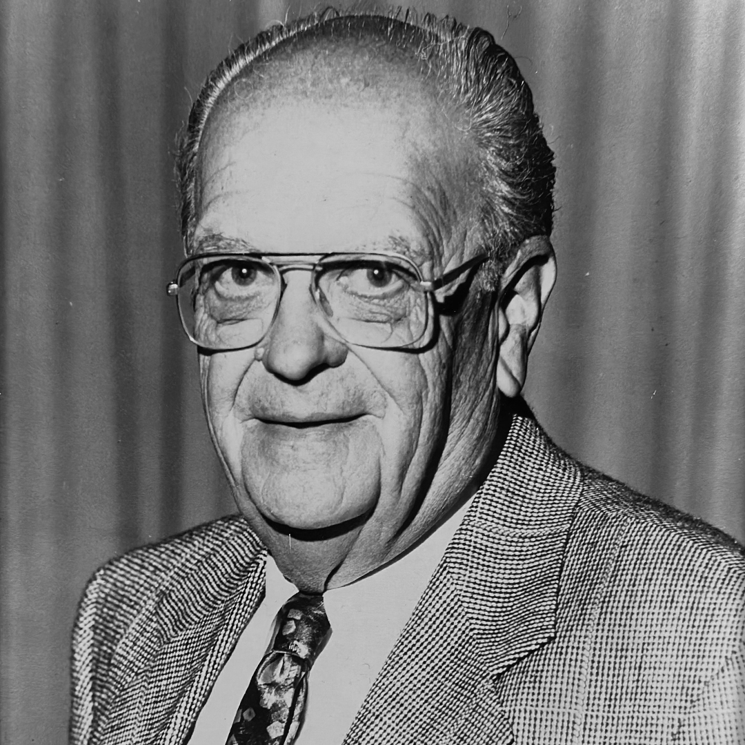 A black and white headshot of Jack Hutcheson. 