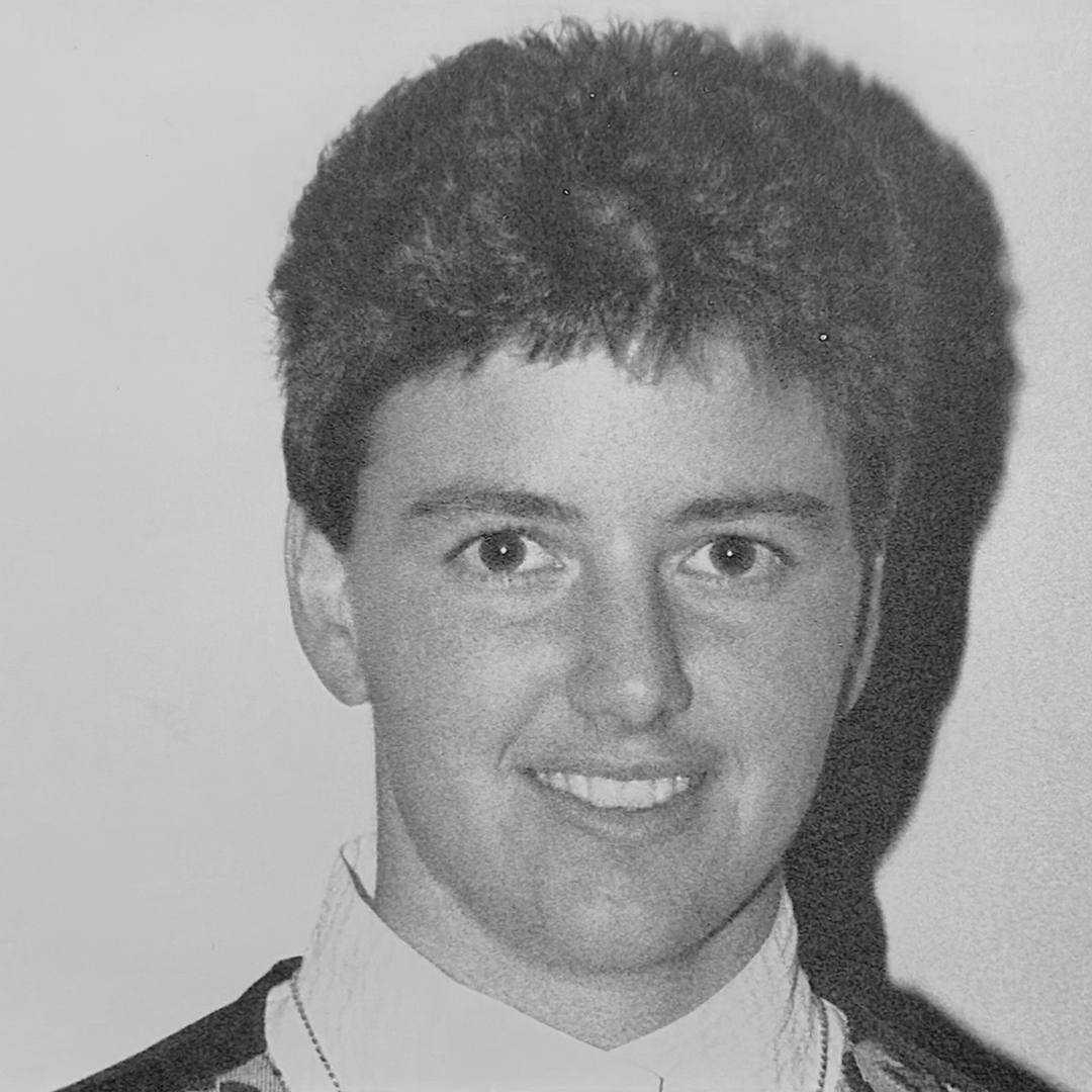 A black and white headshot of Penny English. 